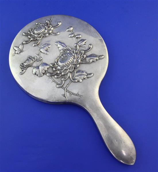 An early 20th century Chinese silver hand mirror, 10.25 in.